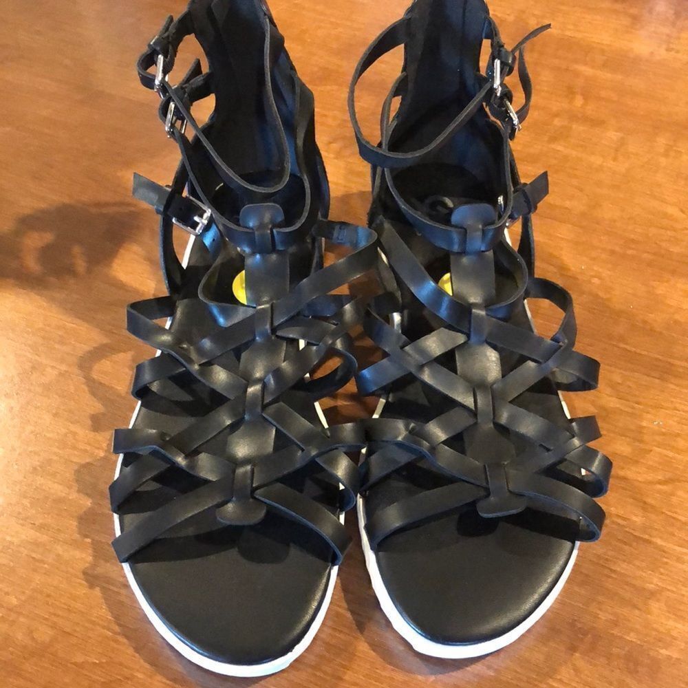Guess womens black sandals size 9.